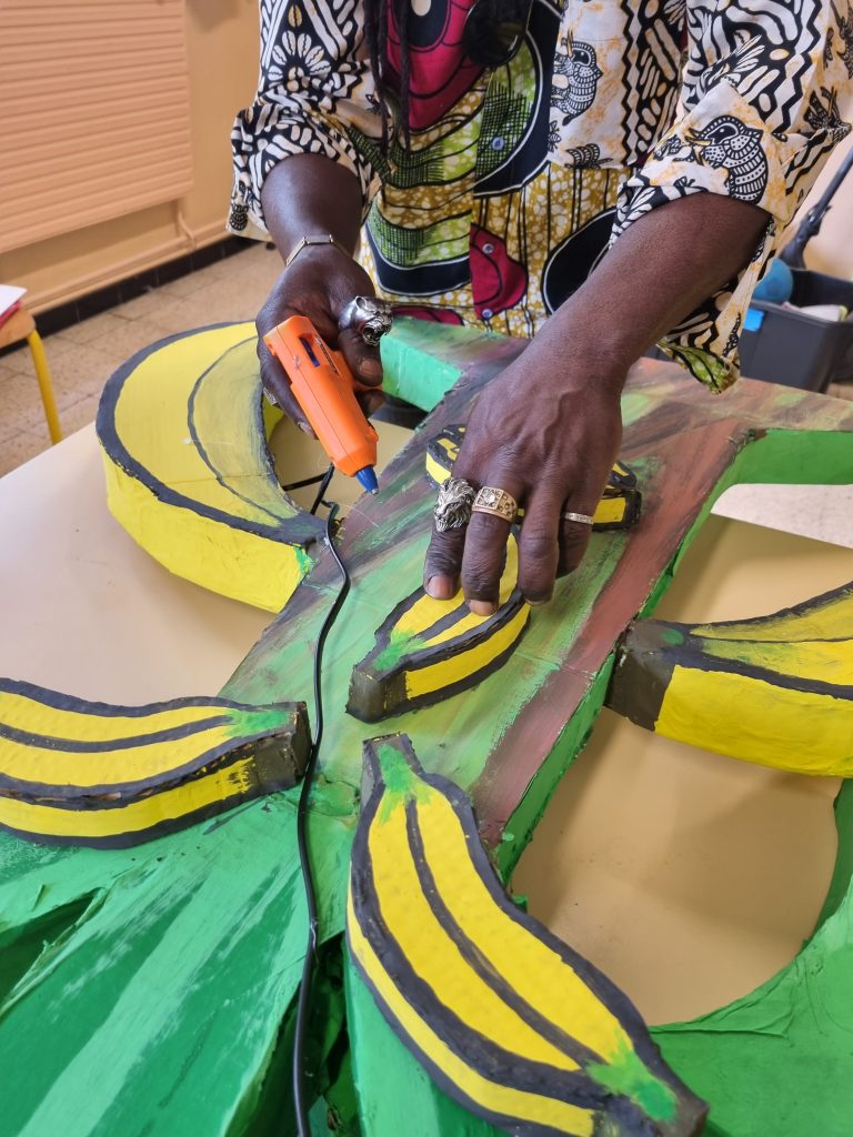 Groupe Garibaldi très actif. 
5 mois de dur labeur / 4 axes majeurs:
- Réunions, débats interactifs, formation d'équipes, recherches, récupération (outils, matériel, etc).
- Alternance: 
Invention / Rédaction des poèmes sur le thème Banane,  Construction du totem & divers jeux compétitifs.
Trophée des jeux: Bananier-Totem achevé.
- Visite éducative & pédagogique à la Cuisine Centrale de la ville.
- Découverte partagée, les merveilles de la Banane: Plats, Gâteaux, Desserts, etc.
Année 2023.