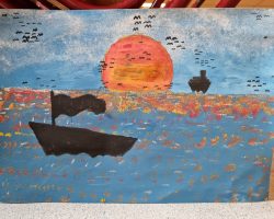 Quand le soleil se couche sur la Mer, loin à l'horizon...
Qu'est-ce qu'on voit ?